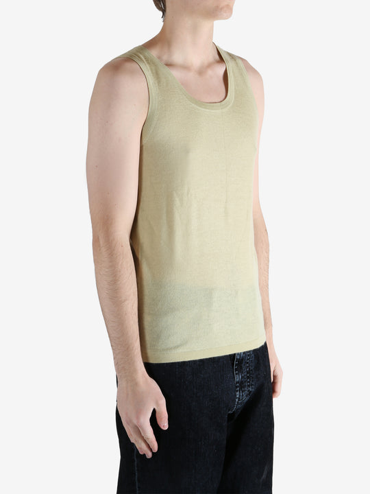 Tan top worn by a person, showing the top fit