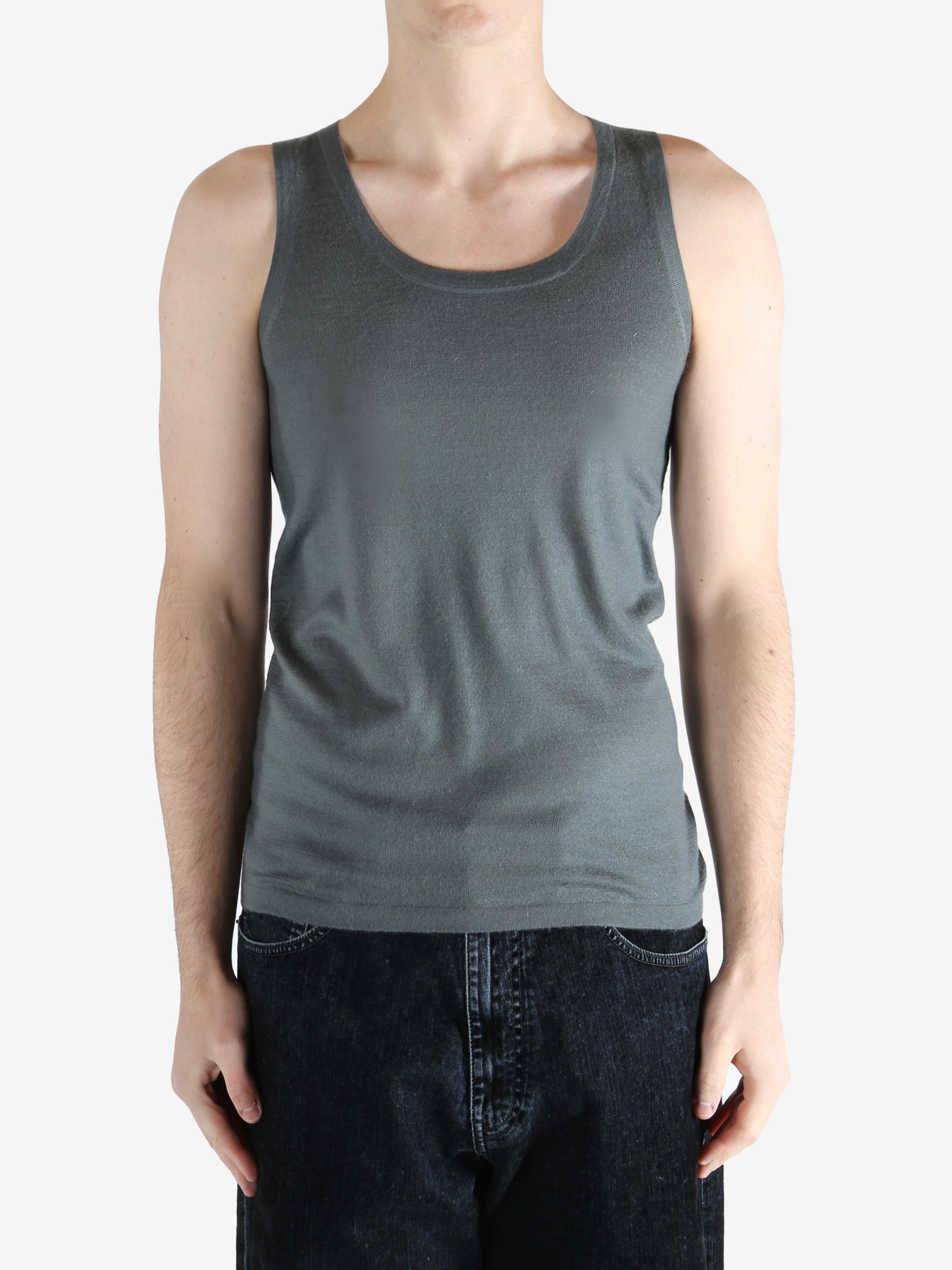 Grey top worn by a person, showing the top fit