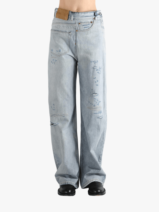 Blue jean  worn by a person, showing the jean 's fit