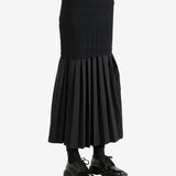 Black skirt worn by a person,showing the skirt's fit