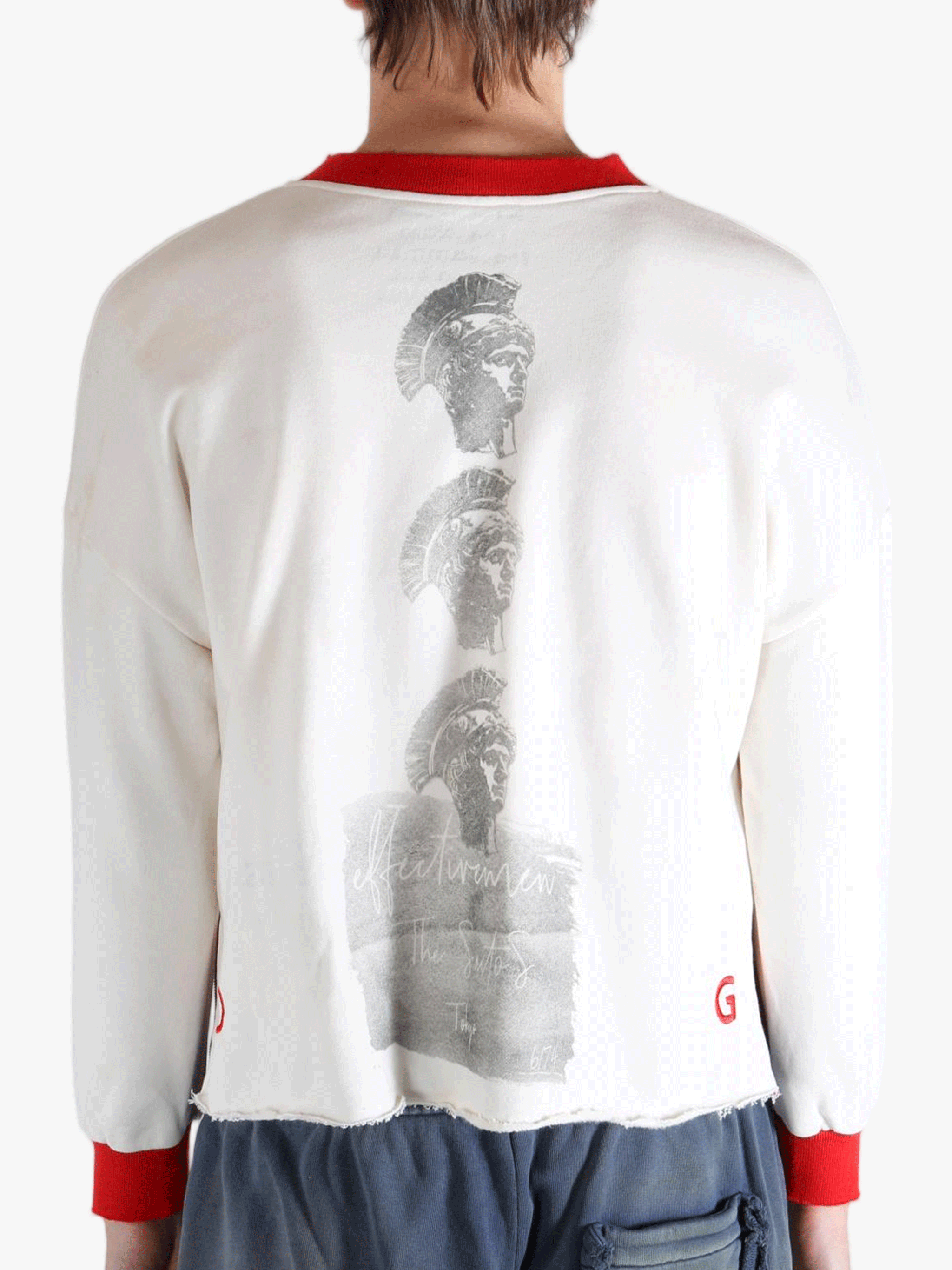 White shirt worn by a person, showing the shirt's fit
