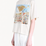 White t-shirts worn by a person, showing the t-shirts' fit