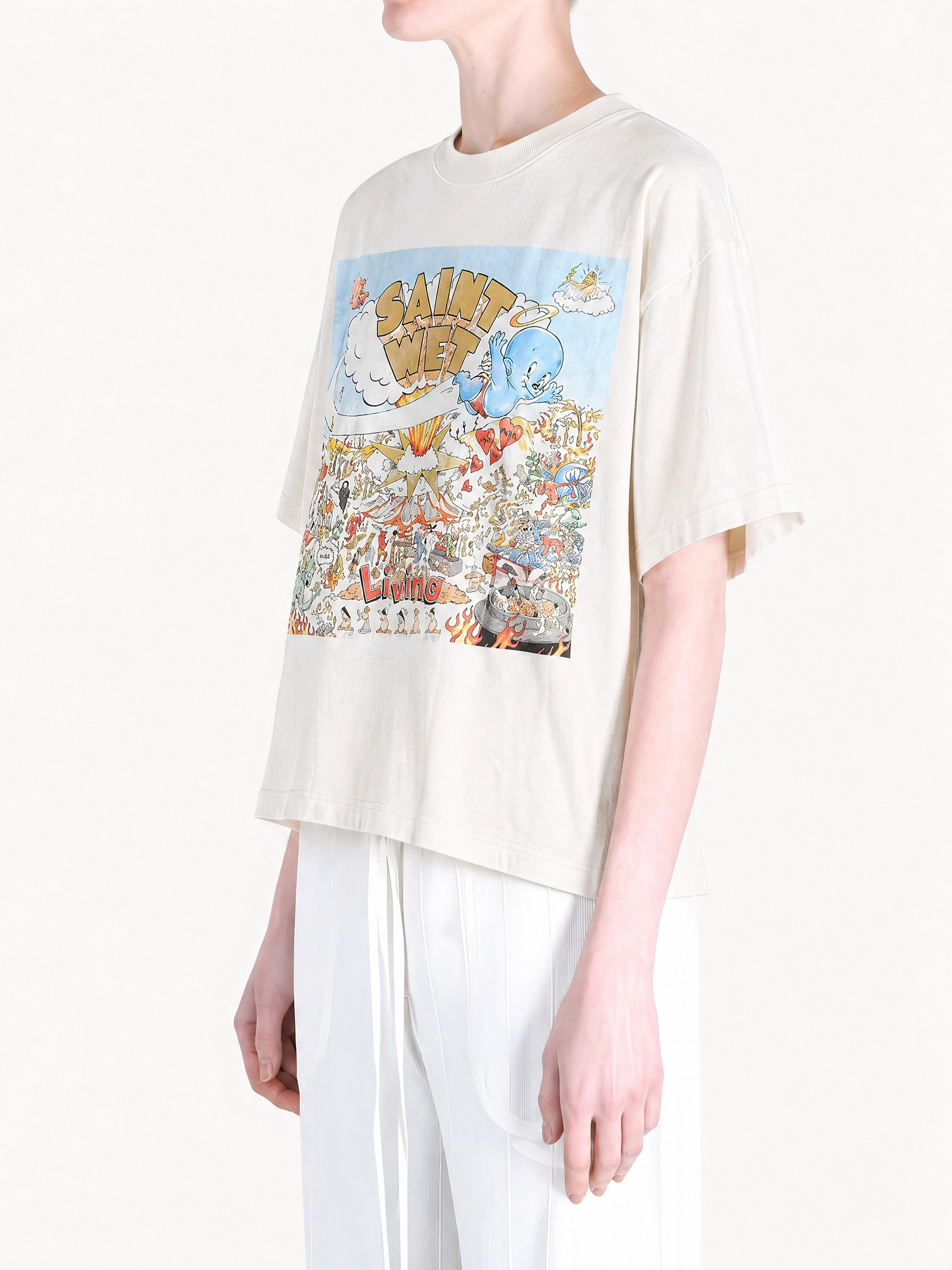 White t-shirts worn by a person, showing the t-shirts' fit