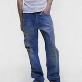 Blue jeans worn by a person, showing the jeans fit