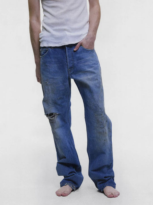 Blue jeans worn by a person, showing the jeans fit
