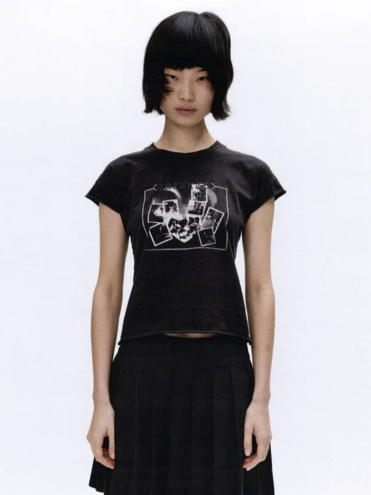 Black t-shirt worn by a person, showing the t-shirt fit