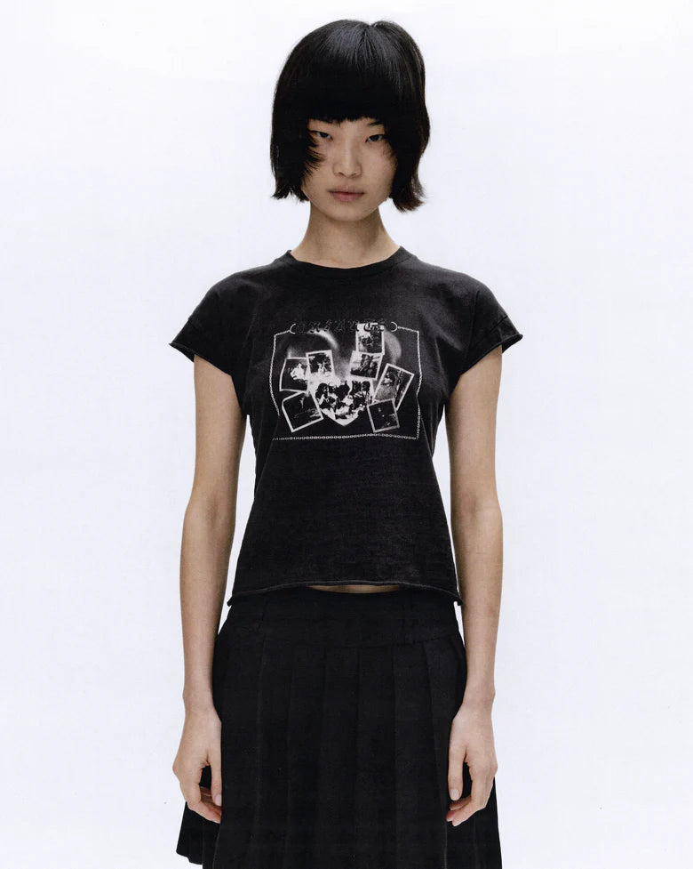 Black t-shirt worn by a person, showing the t-shirt fit