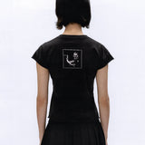 Black t-shirt worn by a person, showing the t-shirt fit