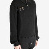 Black T-shirt worn by a person, showing the shirt's fit