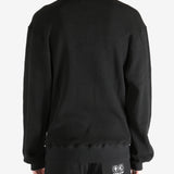 Black T-shirt worn by a person, showing the shirt's fit