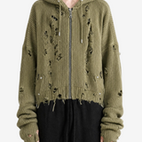 Green hoodie worn by a person, showing the hoodie fit