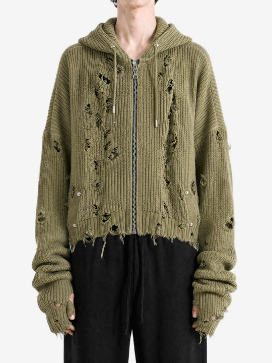 Green hoodie worn by a person, showing the hoodie fit