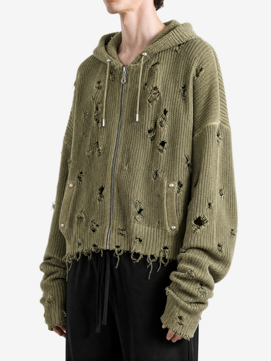 Green hoodie worn by a person, side view