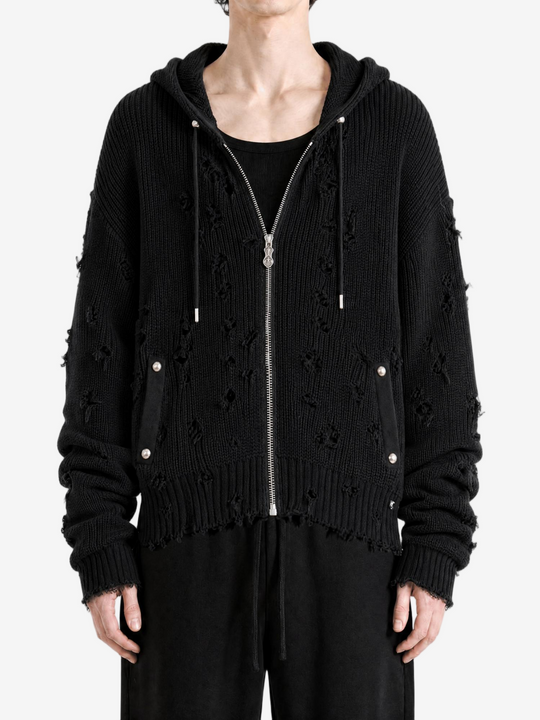 Black hoodie worn by a person, showing the hoodie fit