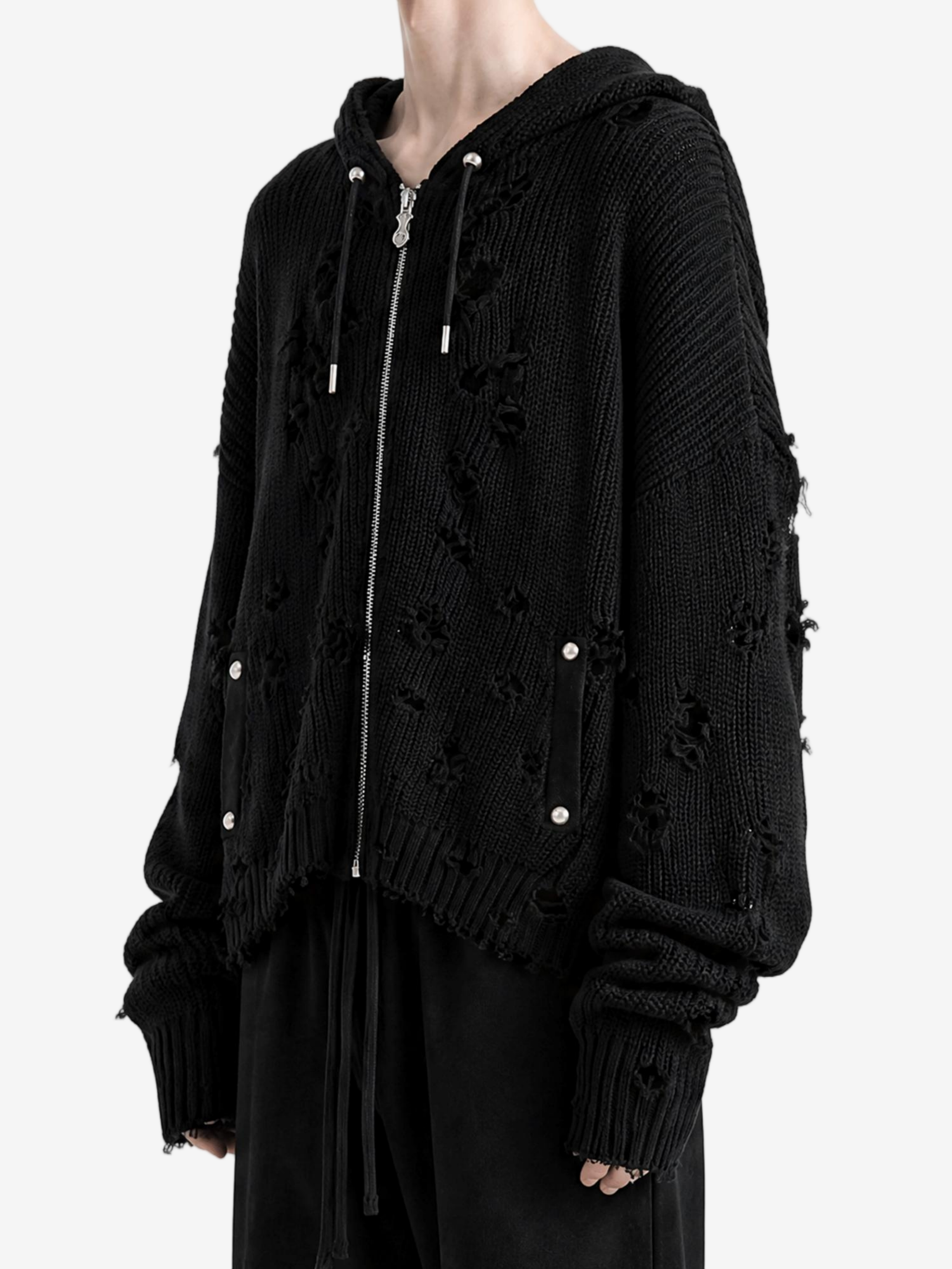 Black hoodie worn by a person, side view