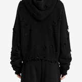 Black hoodie worn by a person, back view