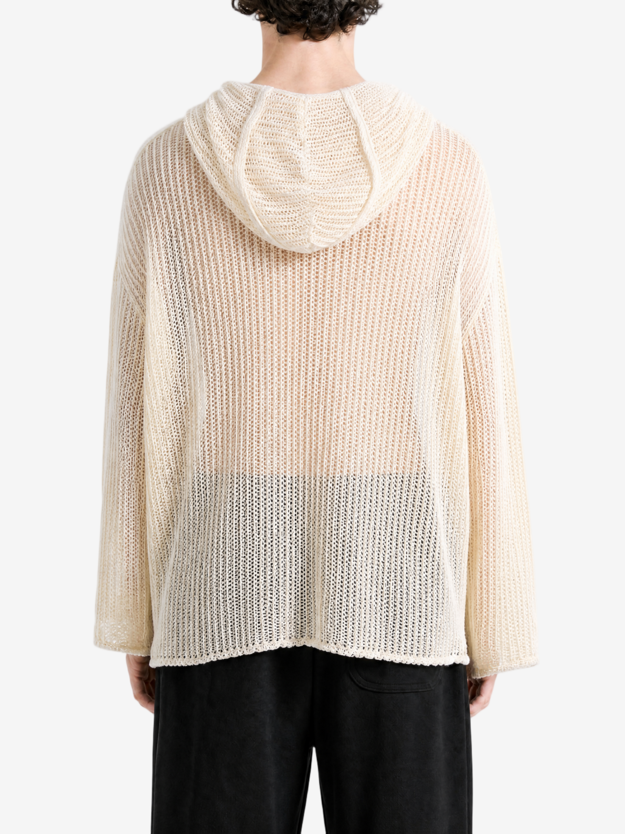White knitwear worn by a person, back view