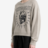 Grey knitwear worn by a person, side view