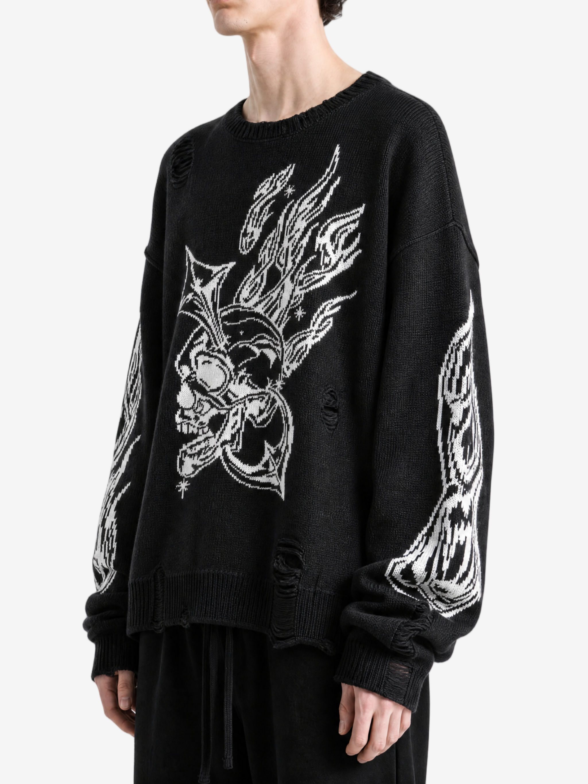 Black hoodie worn by a person, side view