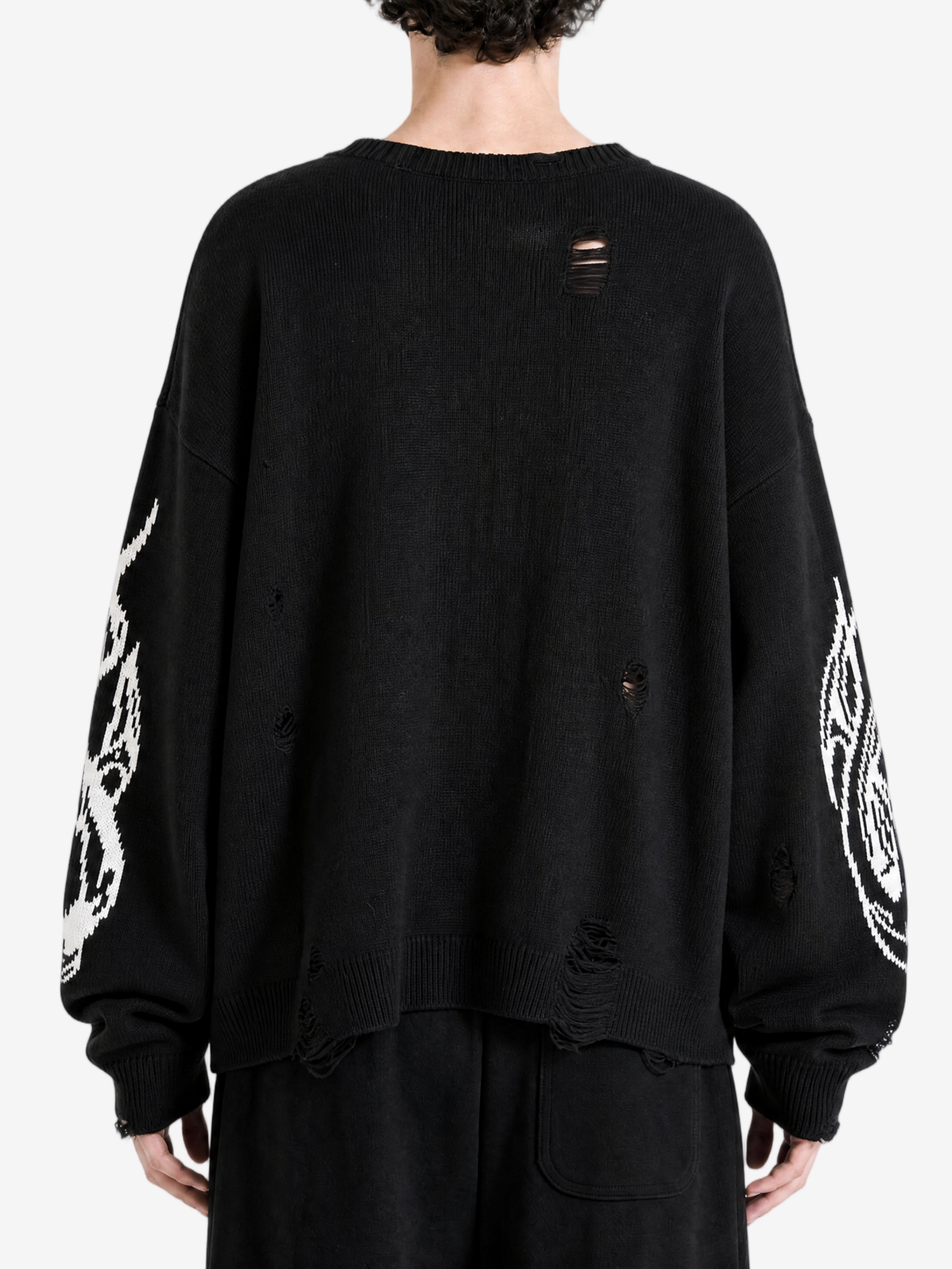 Black hoodie worn by a person, back view