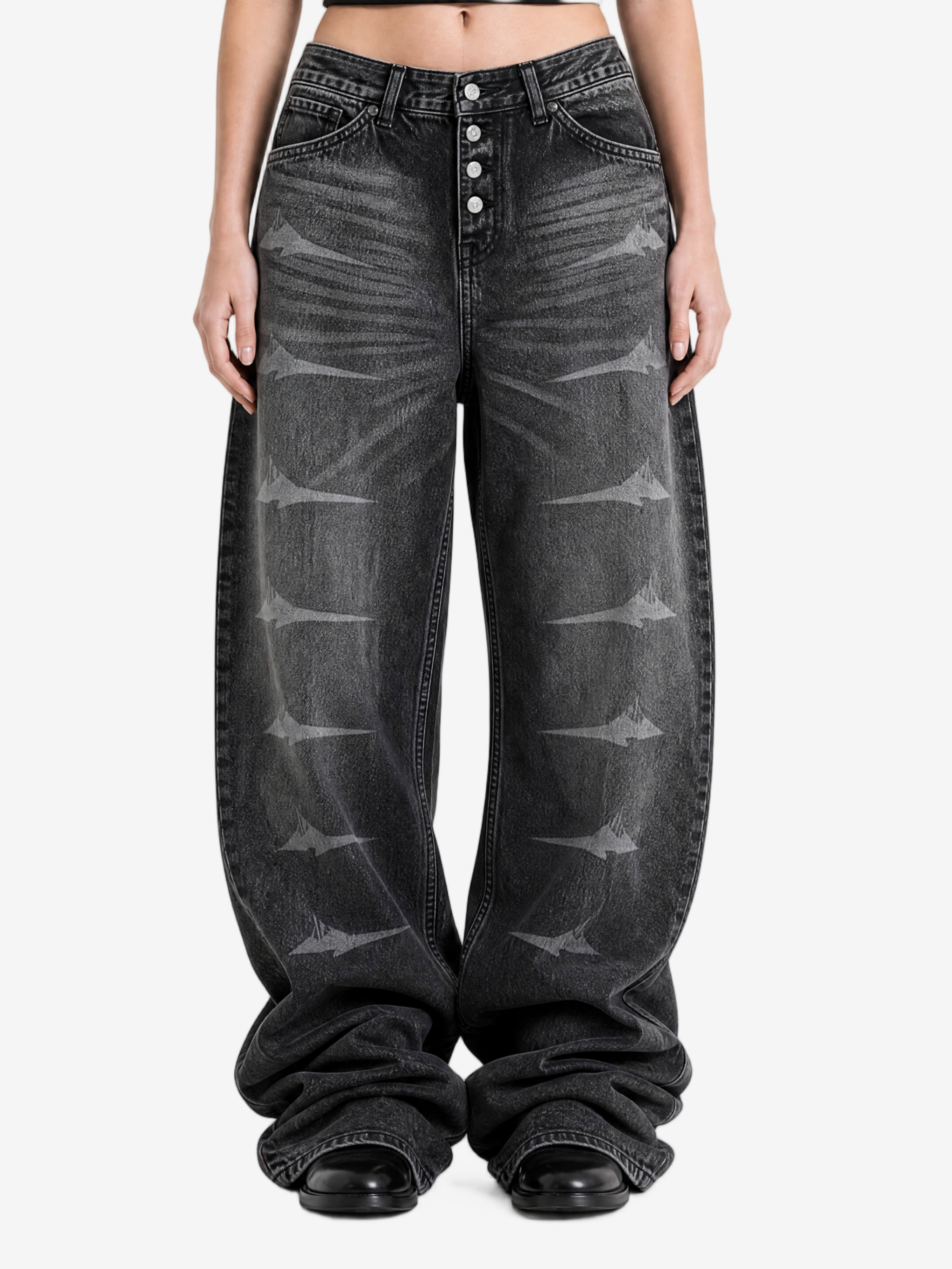 Grey pants worn by a person, showing the pants fit