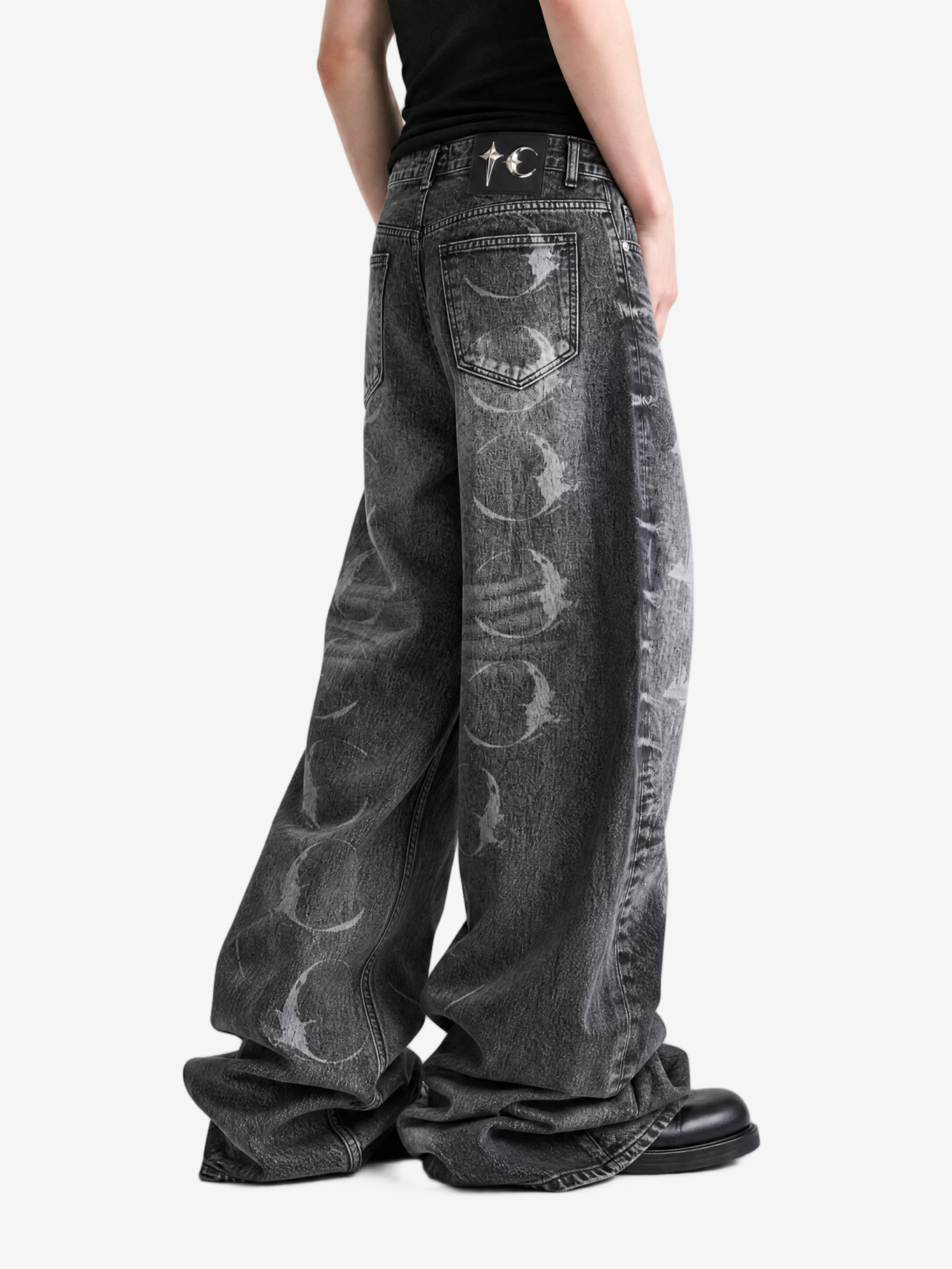 Grey pants worn by a person, side view