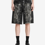 Black shorts worn by a person, showing the shorts fit