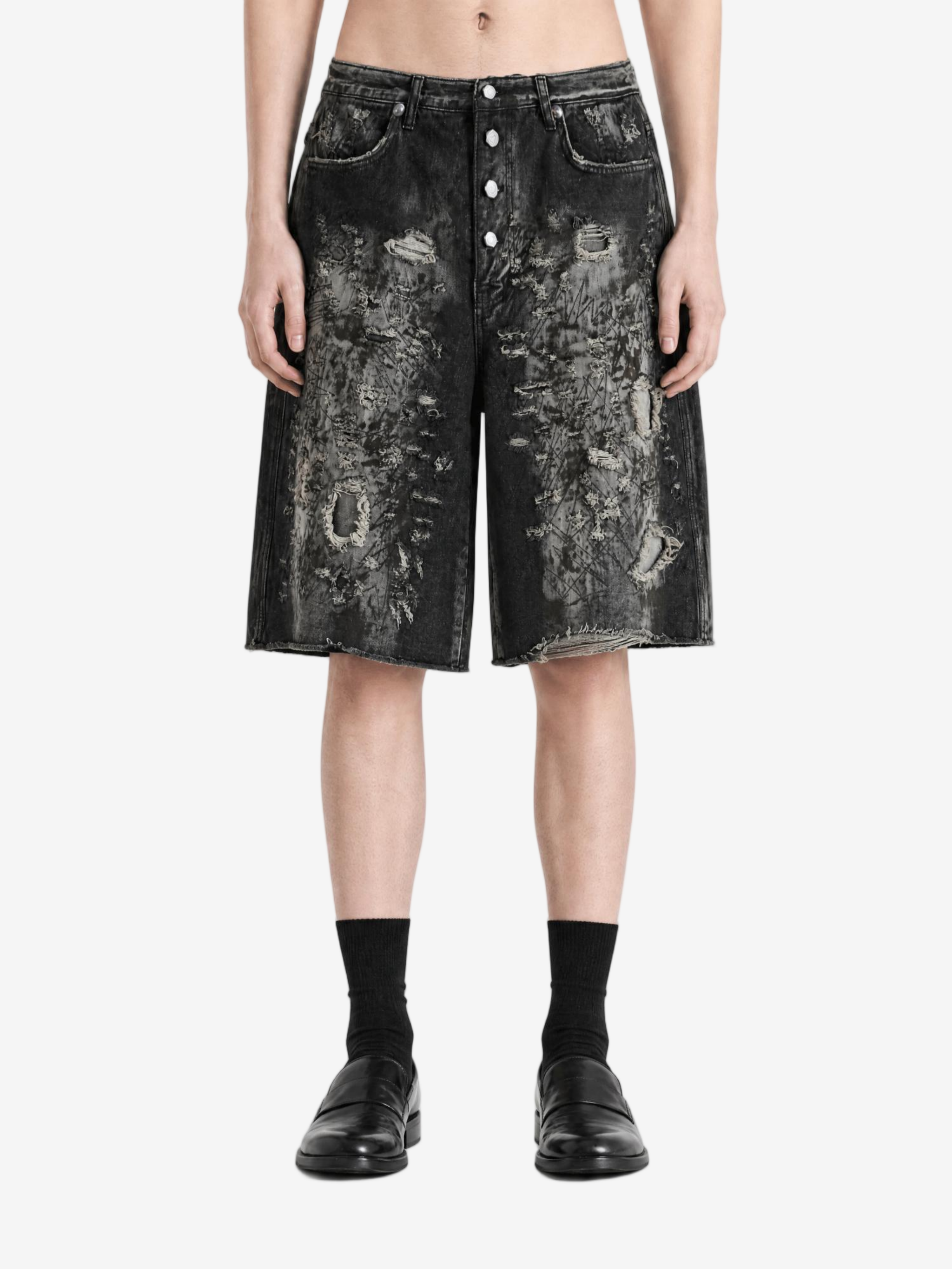 Black shorts worn by a person, showing the shorts fit