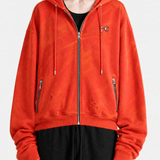 Red hoodie worn by a person, showing the hoodie fit