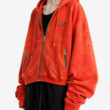 Red hoodie worn by a person, side view