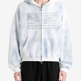 White hoodie worn by a person, showing the hoodie fit