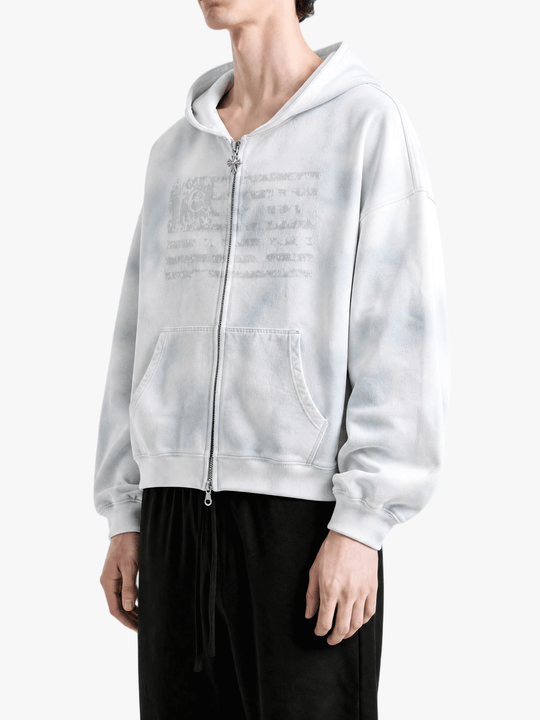 White hoodie worn by a person, side view