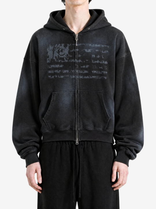 Black hoodie worn by a person, showing the hoodie fit