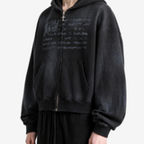 Black hoodie worn by a person, side view