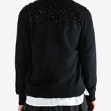 black Cardigan worn by a person, showing the Cardigan fit