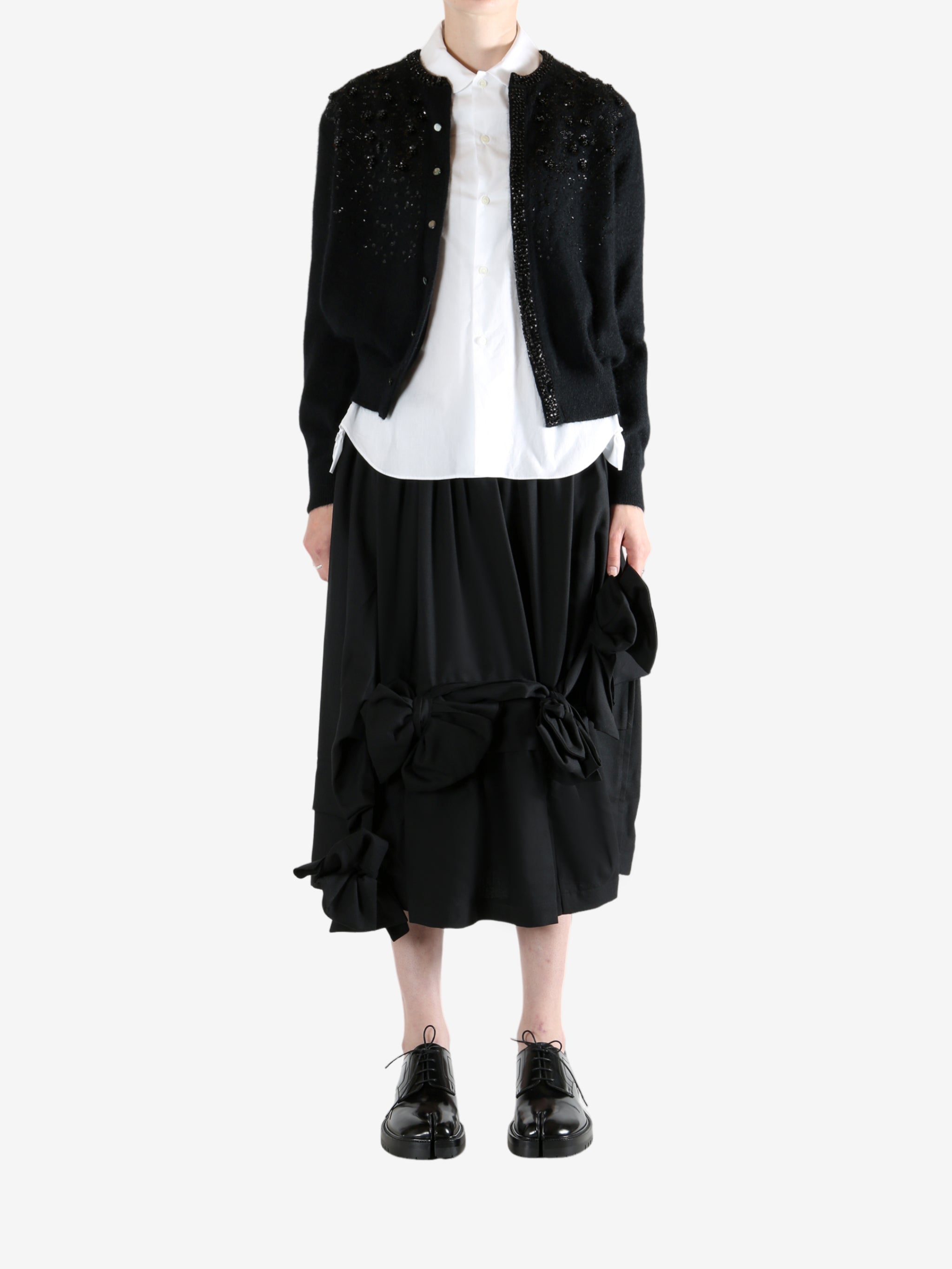 Black knitwear, full body view