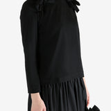 Black t-shirt worn by a person, showing the t-shirt fit