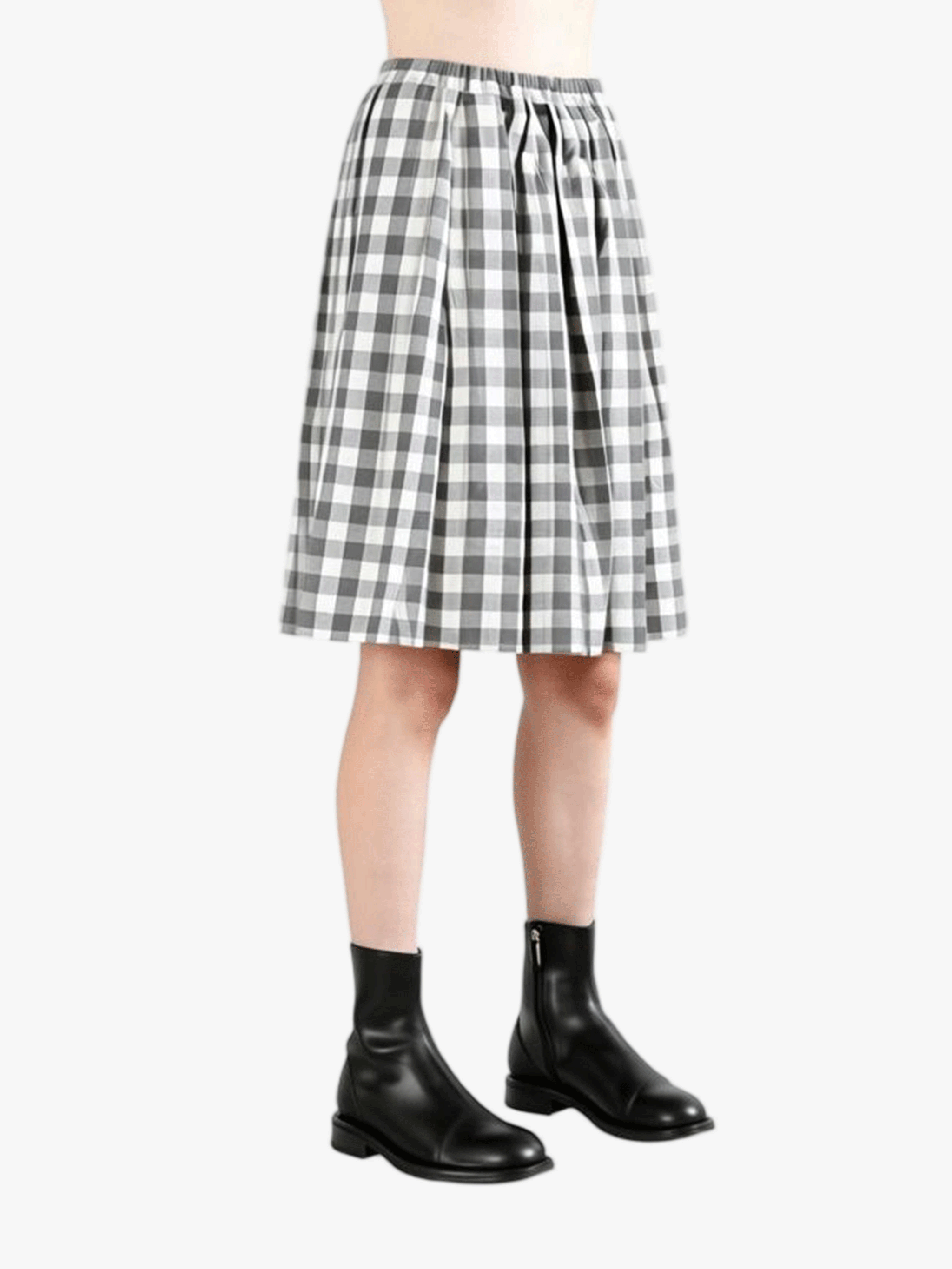 White skirt worn by a person, side view