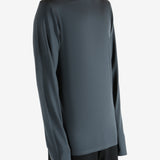 Black jersey worn by a person, showing the jersey's fit