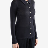 Navy shirt worn by a person, showing the shirt's fit