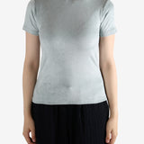 Grey shirt worn by a person, showing the shirt's fit