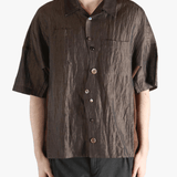 Brown shirt worn by a person, showing the  shirt fit