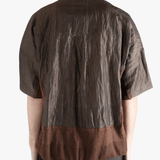 Brown shirt worn by a person, showing the  shirt fit