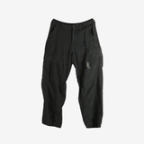 Black cargo pants on a white background