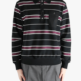 Black t-shirt worn by a person, showing the shirt's fit