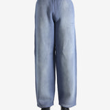 Navy pants worn by a person, showing the pants' fit