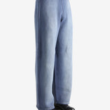 Navy pants worn by a person, showing the pants' fit