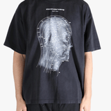 Black t-shirt worn by a person, showing the t-shirt's fit