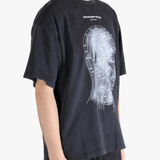Black t-shirt worn by a person, showing the t-shirt's fit