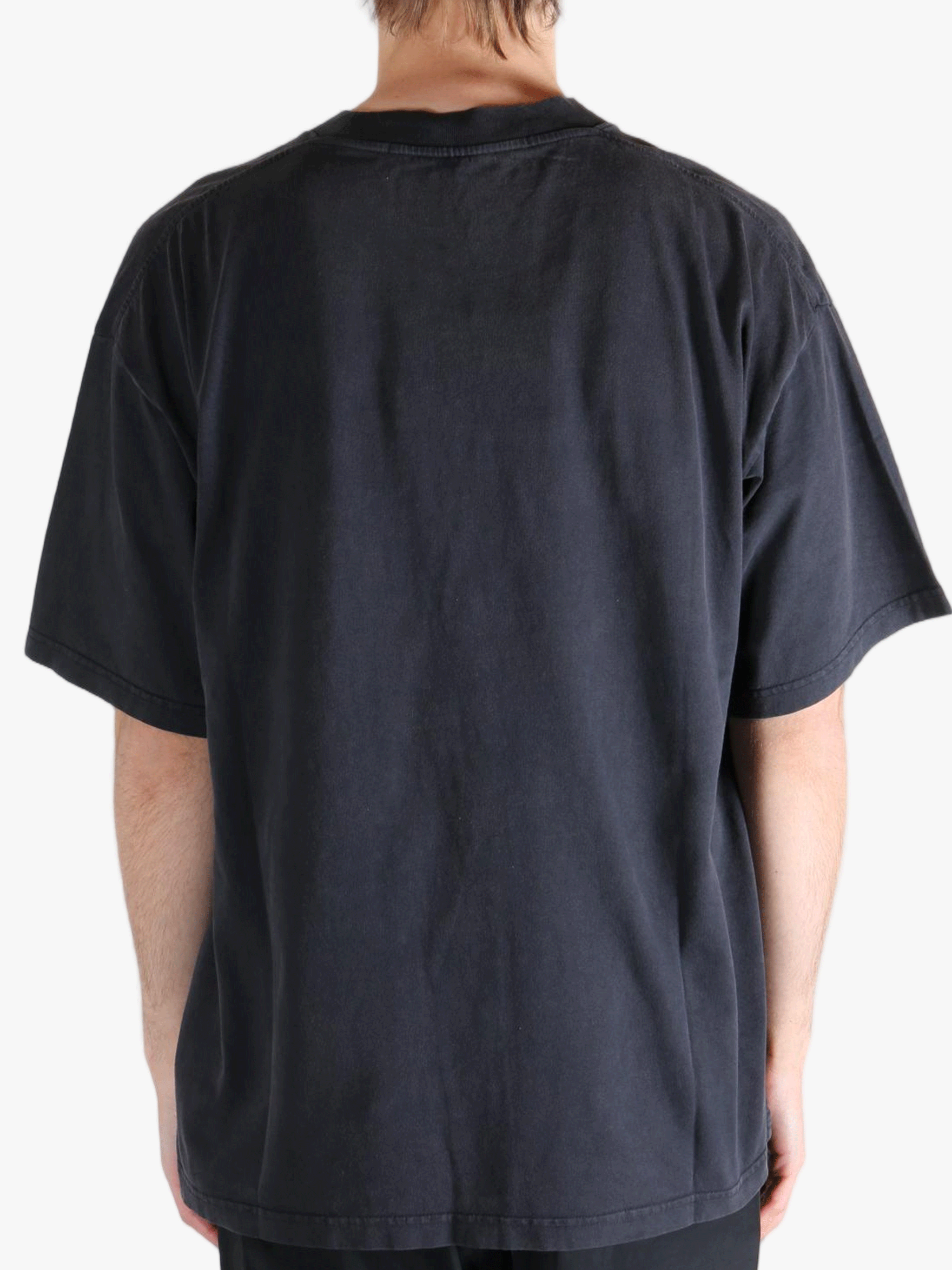 Black t-shirt worn by a person, showing the t-shirt's fit
